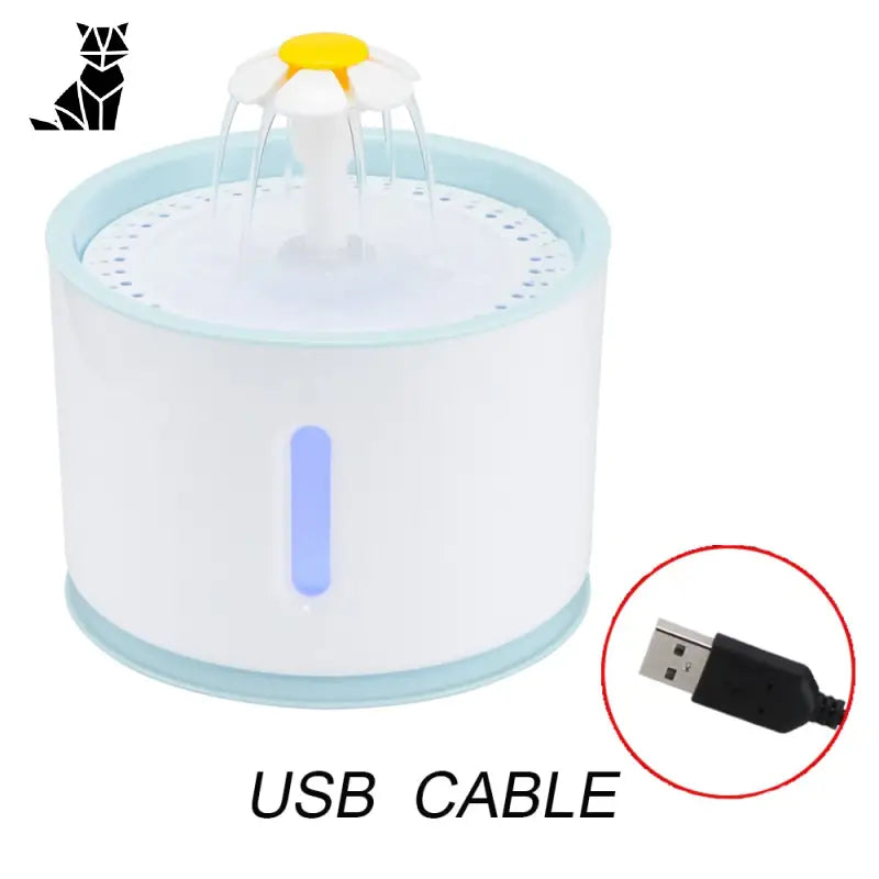 Gros plan sur le câble USB connecté à l’acier inoxydable fontaine pour chats